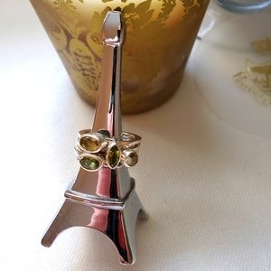 4 Stacking Rings in sterling silver with yellow & green peridot stones.